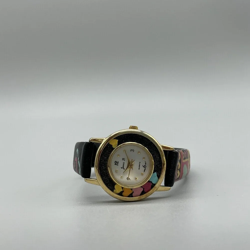 Jennie B Women Watch 24mm White Dial Black Hearts Design Band Gold Tone New Batt